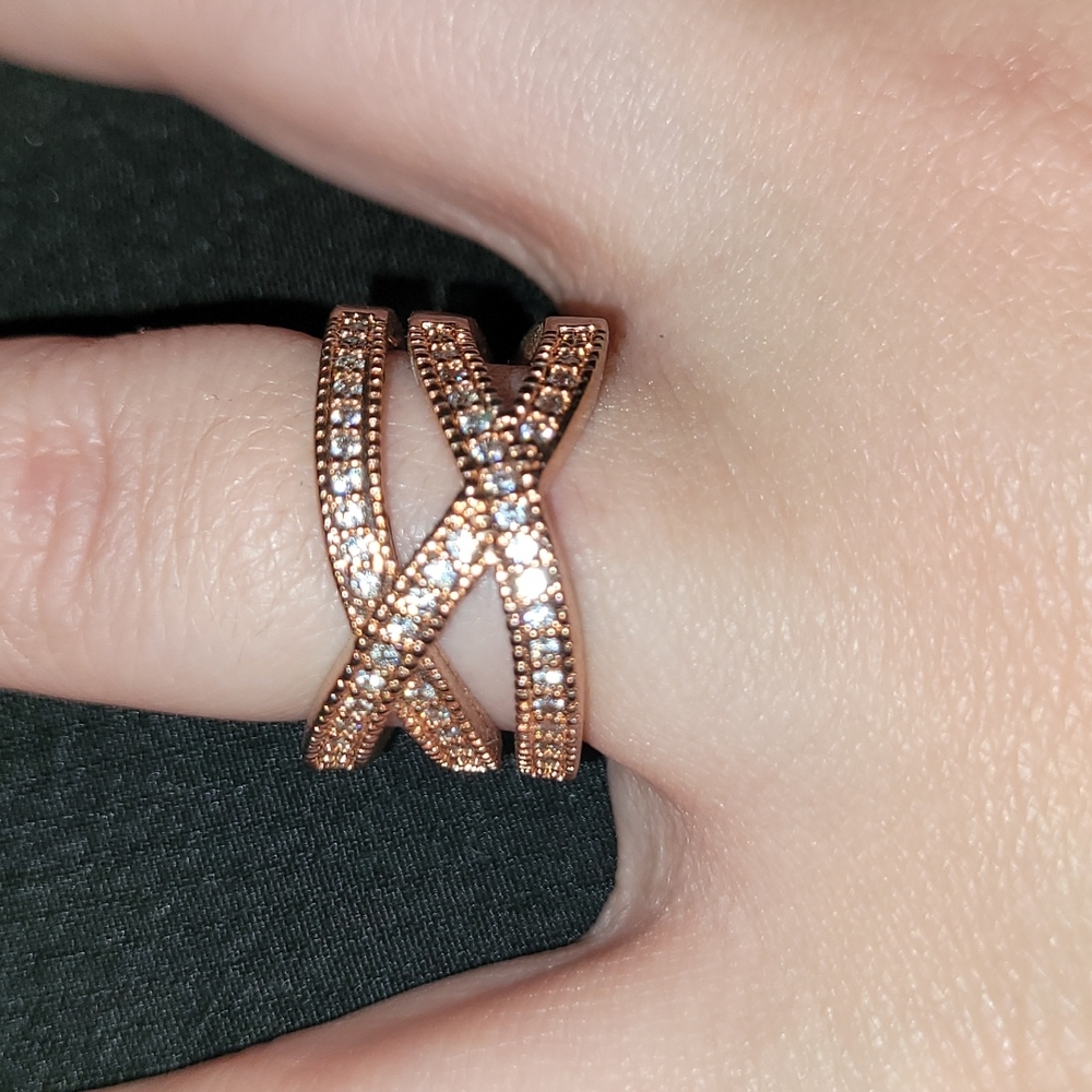 Rose gold colored cross ring with crystals